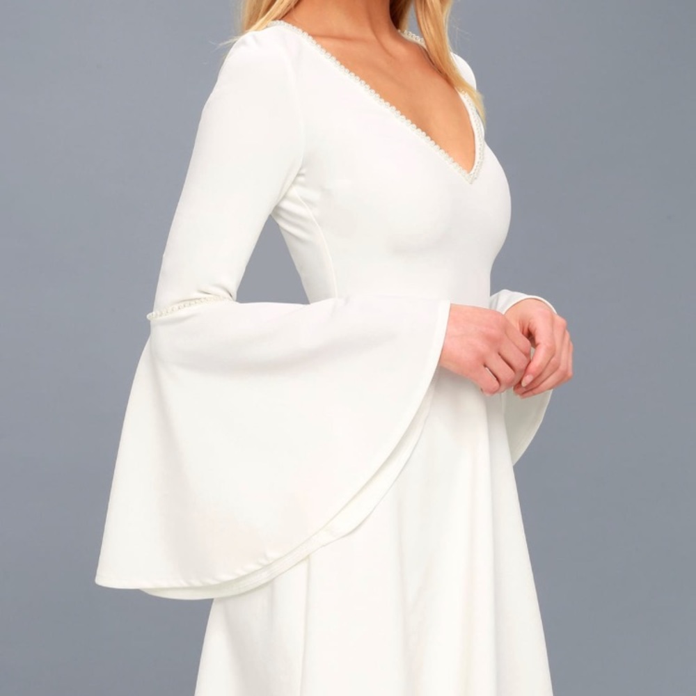 White dress, perfect for Any occasion. Brand New